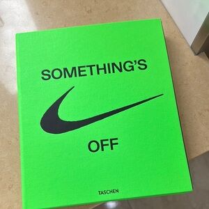 TASCHEN Neon Green Book with Black Text